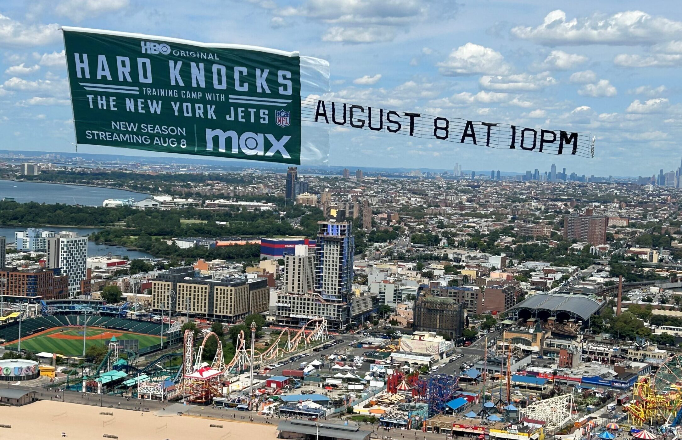 TV show banner over beach, Aerial sports series advertisement